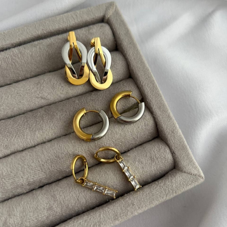 گوشواره استیل زنانه طرح مار چشم سبز تنوع طرح رنگ ثابت کد tj (پس کرایه)
