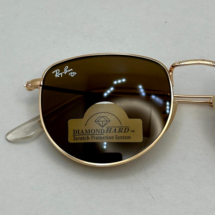عینک آفتابی ریبن rayban شیشه سنگ قهوه ای طلایی کد rb 3958 - فول پک (ارسال رایگان)